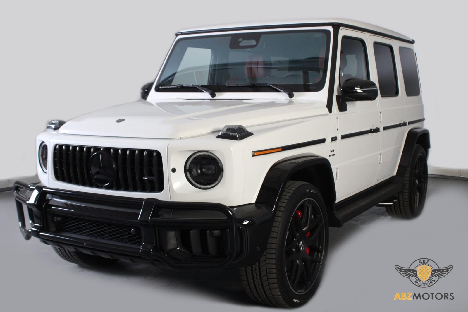 Mercedes-Benz G 55 AMG ブラックとCLS ホワイトのセット Mercedes-Benz G 55 AMG ブラックとCLS ホワイトのセット